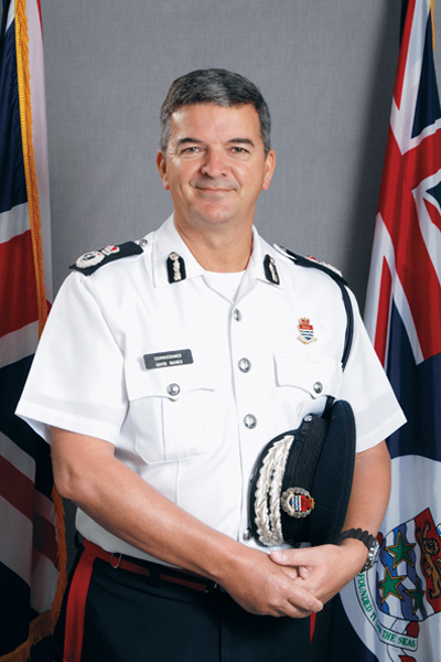 Mr. David Baines OBE, Commissioner of Police